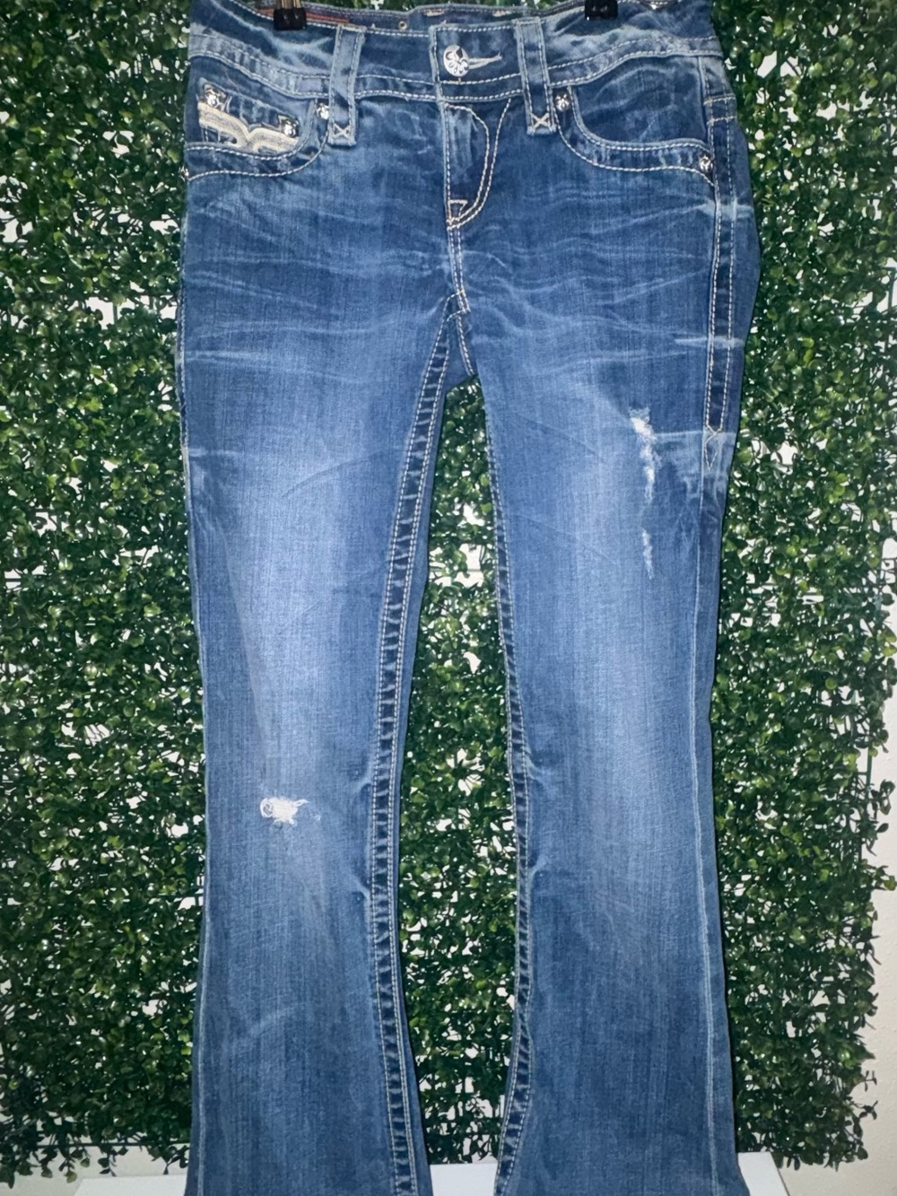 Rock Revival Women's Blue Flare Jeans with Subtle Distressing